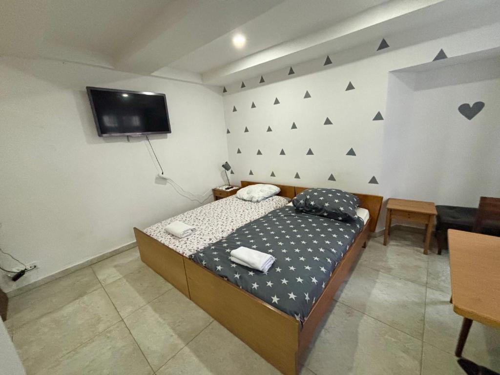 Postel nebo postele na pokoji v ubytování City Apartments Basel