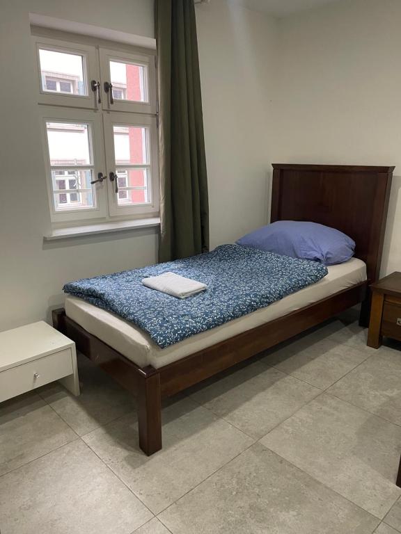 Postel nebo postele na pokoji v ubytování City Apartments Basel