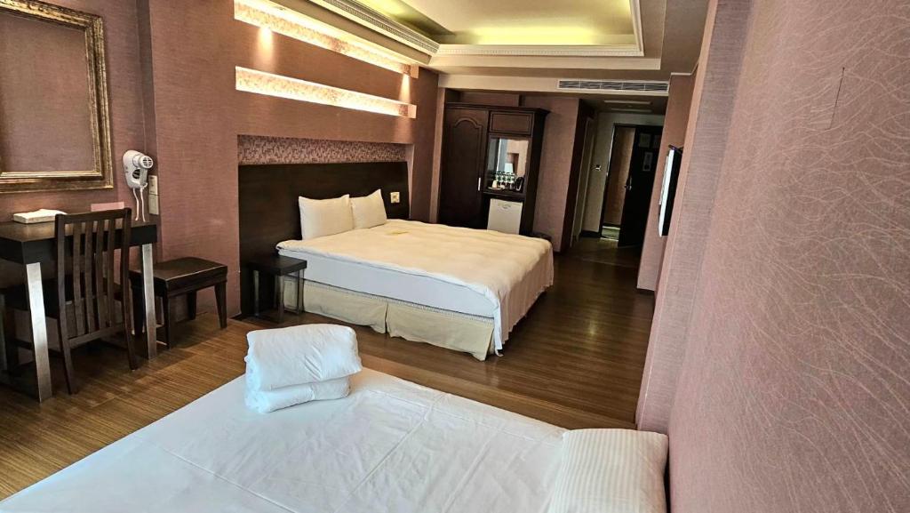 Postel nebo postele na pokoji v ubytování Bitan Hotel