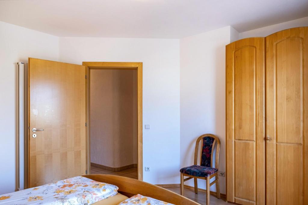 Postel nebo postele na pokoji v ubytování Valtlhof - Apt 1