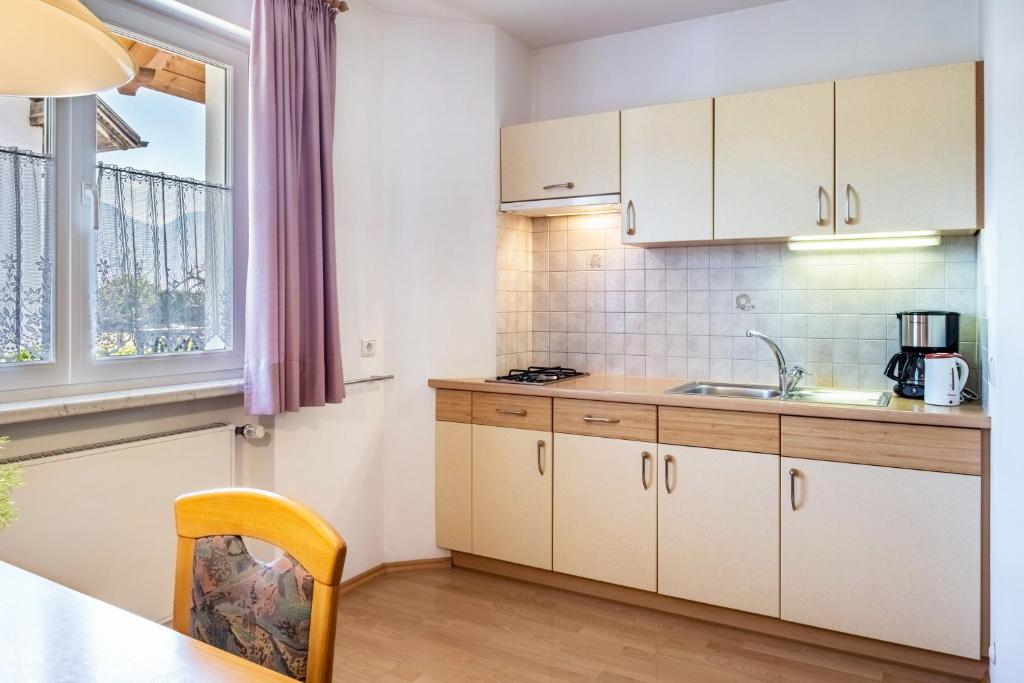 Kuchyň nebo kuchyňský kout v ubytování Valtlhof - Apt 1