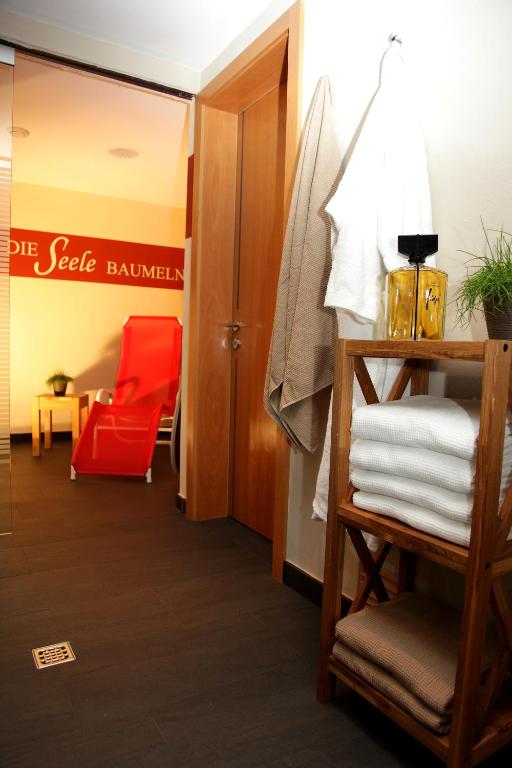 Postel nebo postele na pokoji v ubytování Hotel Garni Aurora