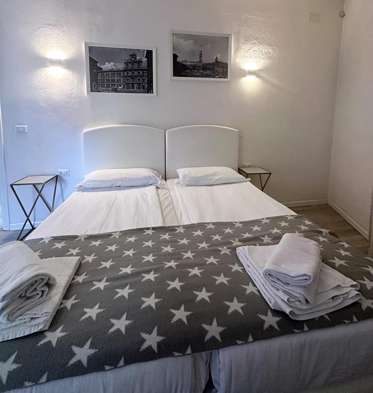 Postel nebo postele na pokoji v ubytování Albergo del Pozzo