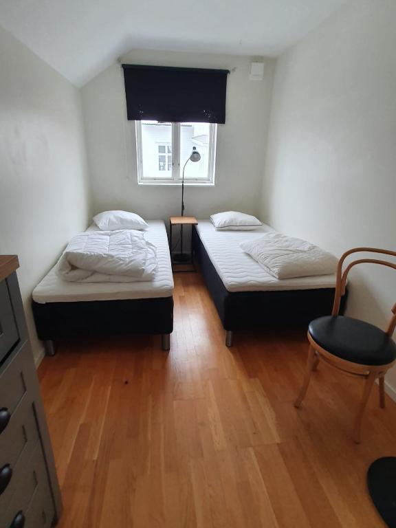 Postel nebo postele na pokoji v ubytování 5 sovrum 9 bäddar 12 sovplatser