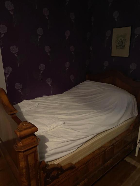 Postel nebo postele na pokoji v ubytování La Villa De L'etang Burgundy