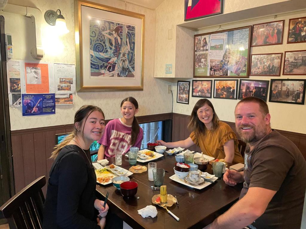 Hosté ubytování LiveCafe & Hotelひすいの海