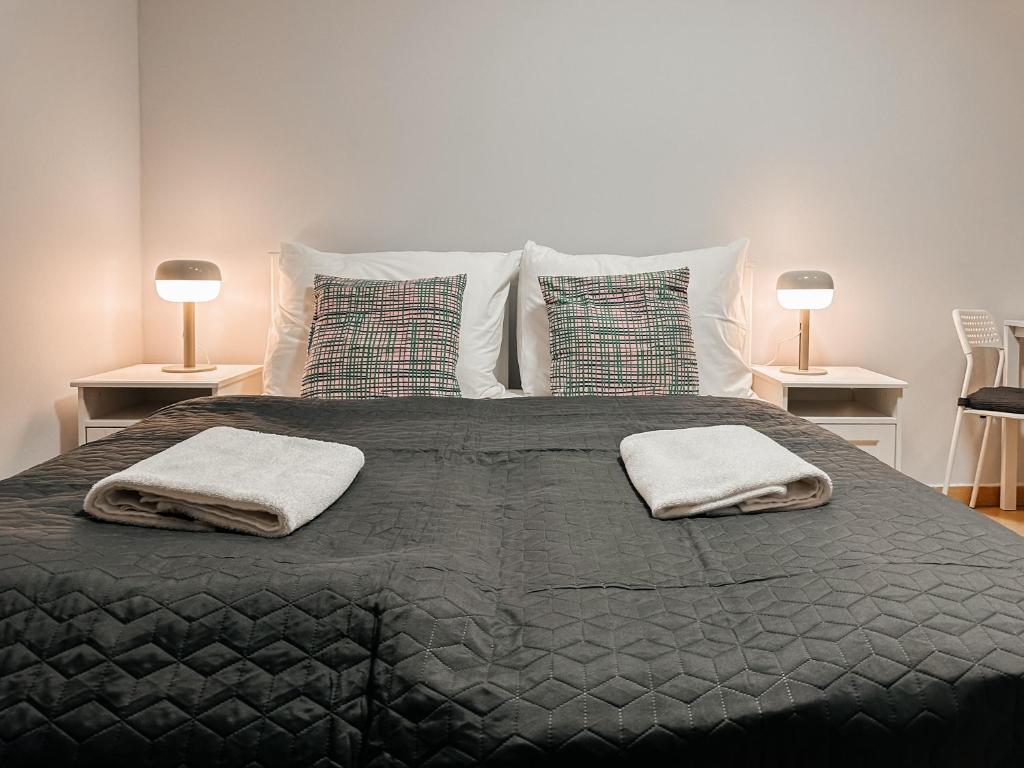 Postel nebo postele na pokoji v ubytování ELSO apartments
