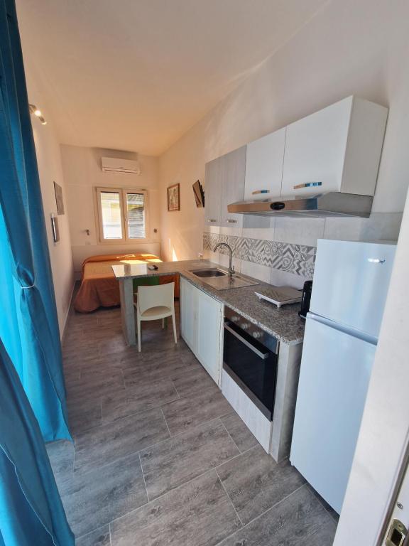 Køkken eller tekøkken på Monolocale centrale Tortolì