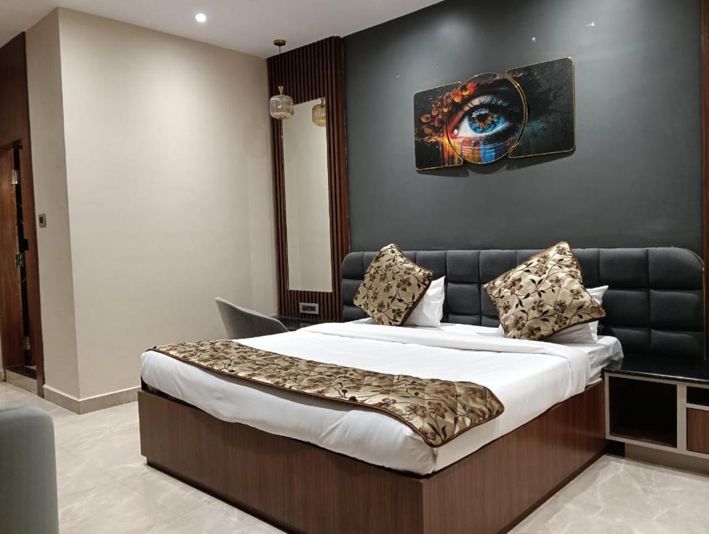 Postel nebo postele na pokoji v ubytování Hotel Hello Jeypore