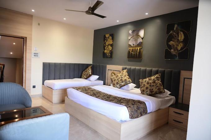 Postel nebo postele na pokoji v ubytování Hotel Hello Jeypore