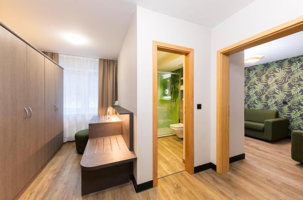 Letto o letti in una camera di Hotel Waldmühle