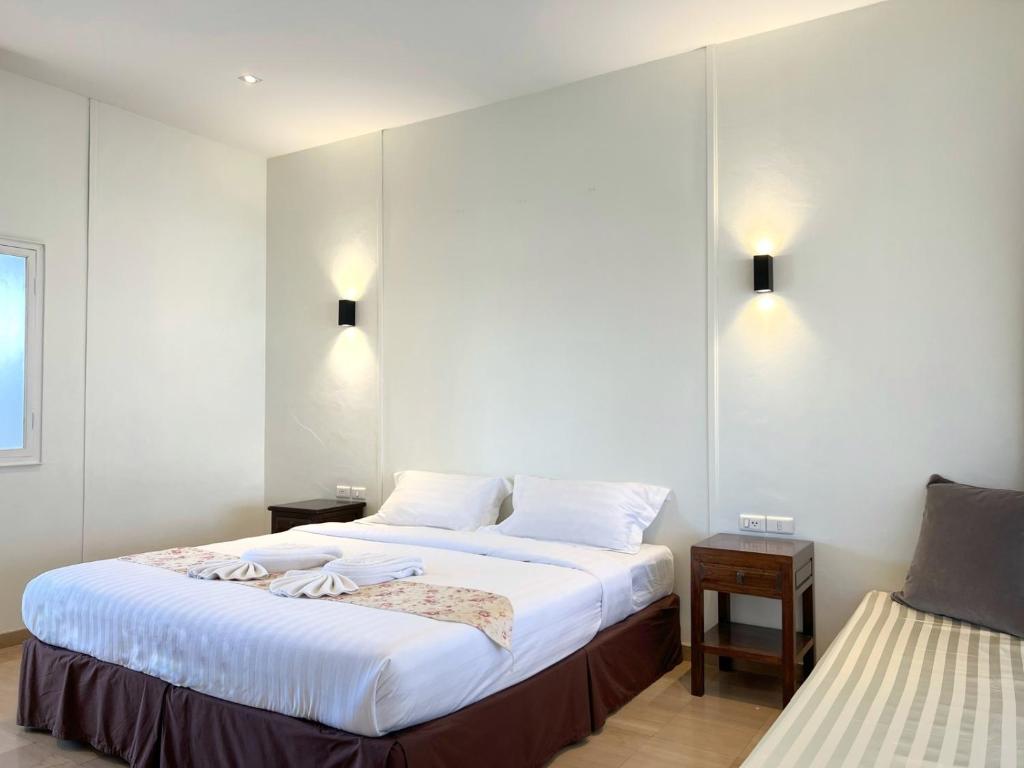 Postel nebo postele na pokoji v ubytování 3B Boutique Hotel