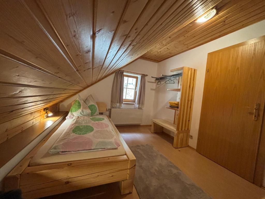 A bed or beds in a room at Eggerhof