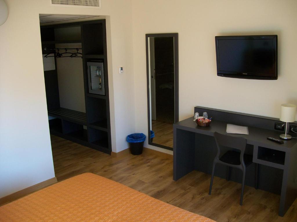 TV a/nebo společenská místnost v ubytování Hotel Motel Giglio
