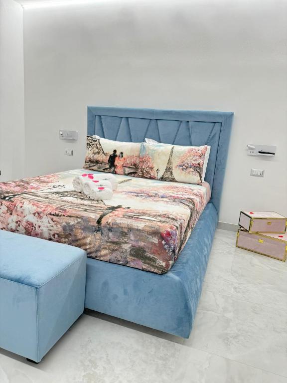 Postel nebo postele na pokoji v ubytování Nuance Suite & Rooms