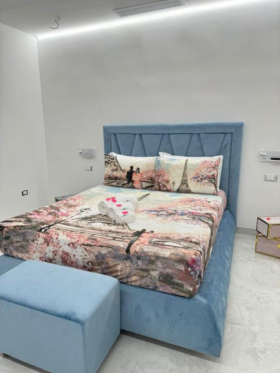 Postel nebo postele na pokoji v ubytování Nuance Suite & Rooms