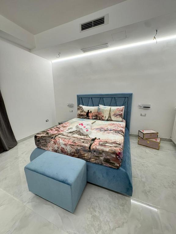 Postel nebo postele na pokoji v ubytování Nuance Suite & Rooms