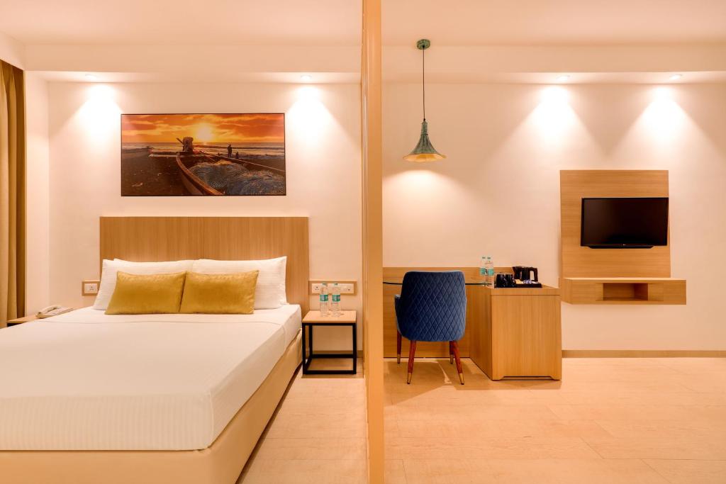 Postel nebo postele na pokoji v ubytování Keys Prima by Lemon Tree Hotels, Katti-Ma, Chennai