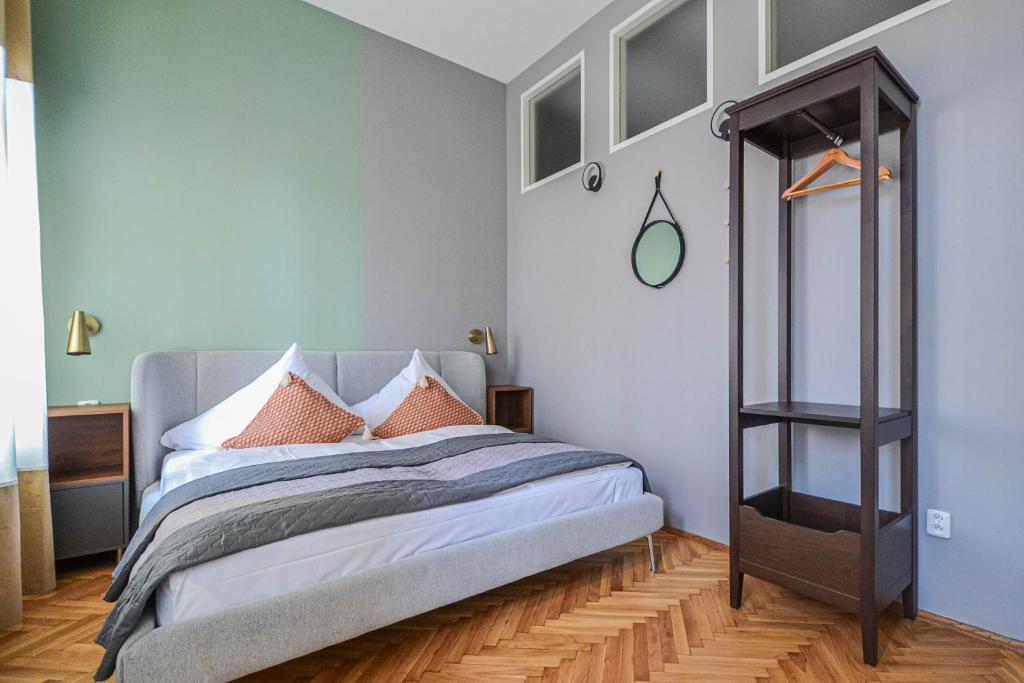 Postel nebo postele na pokoji v ubytování Celebration Flat by Ruterra