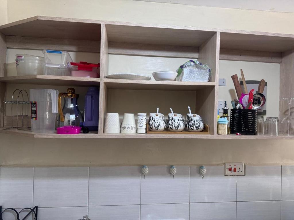 Kuchyň nebo kuchyňský kout v ubytování Cavendish Square Apartments Syokimau