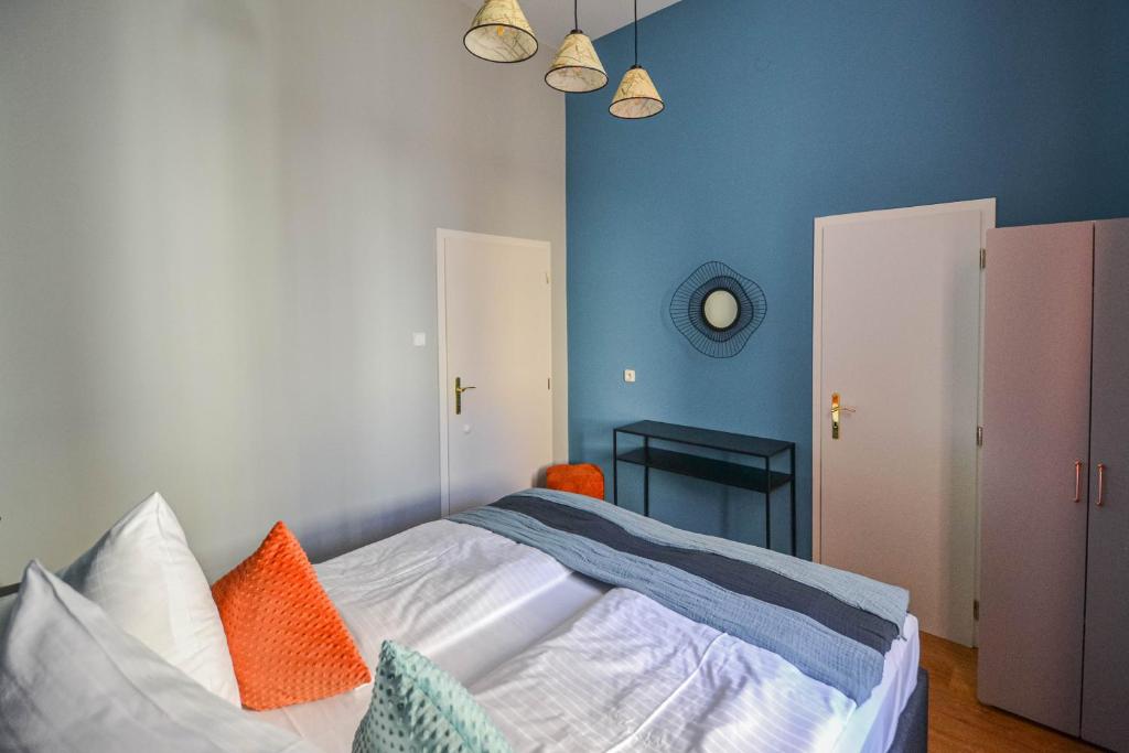 Postel nebo postele na pokoji v ubytování Celebration Flat by Ruterra