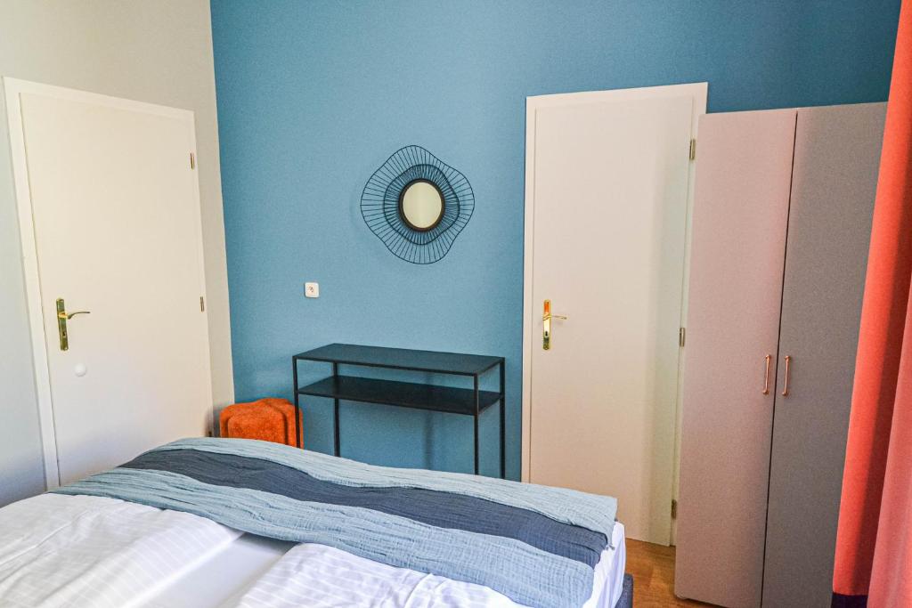 Postel nebo postele na pokoji v ubytování Celebration Flat by Ruterra