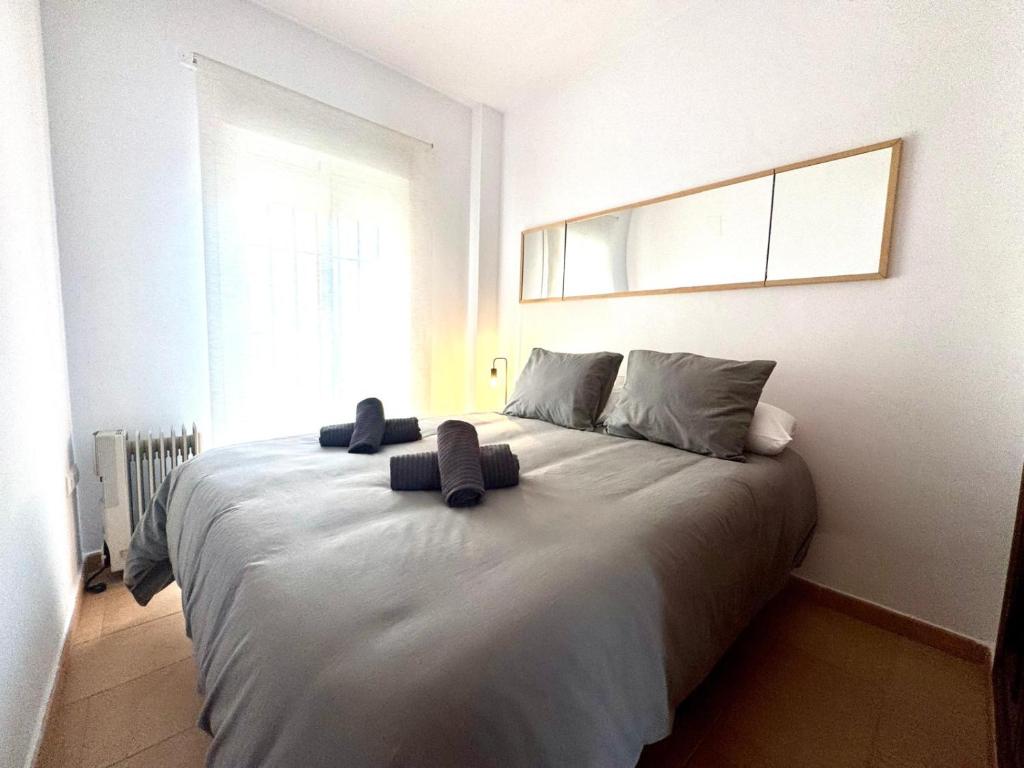 Posteľ alebo postele v izbe v ubytovaní Mirador de Doñana Nº 7, Apartamentos Living Sur
