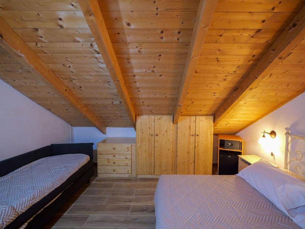 Postel nebo postele na pokoji v ubytování Hotel Bamby