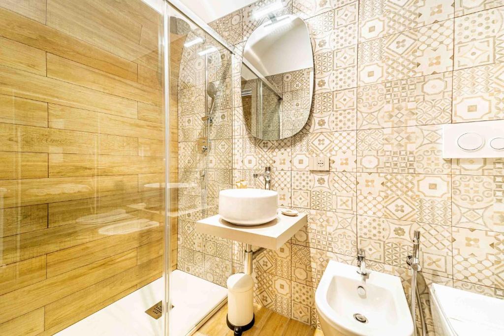 A bathroom at Il Melograno - Suite Deluxe