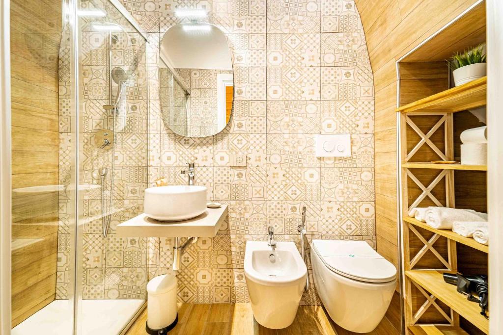 A bathroom at Il Melograno - Suite Deluxe