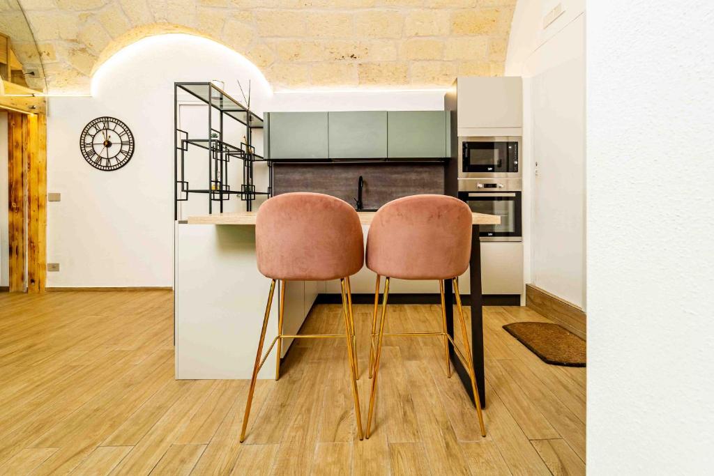 A kitchen or kitchenette at Il Melograno - Suite Deluxe