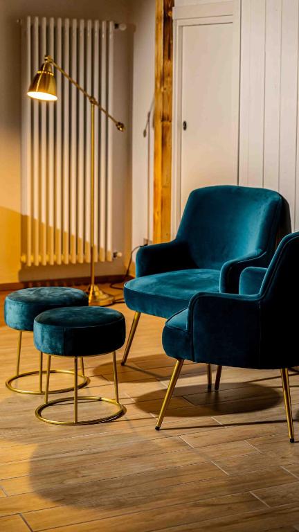 A seating area at Il Melograno - Suite Deluxe