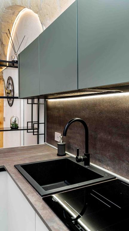 A kitchen or kitchenette at Il Melograno - Suite Deluxe