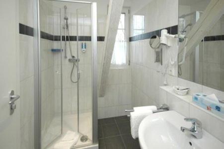 Koupelna v ubytování Rotenberg PT Hotel