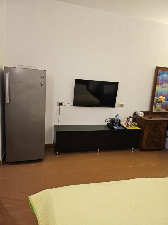 TV a/nebo společenská místnost v ubytování Domina Coral Bay Sea View Studio with Kitchenette