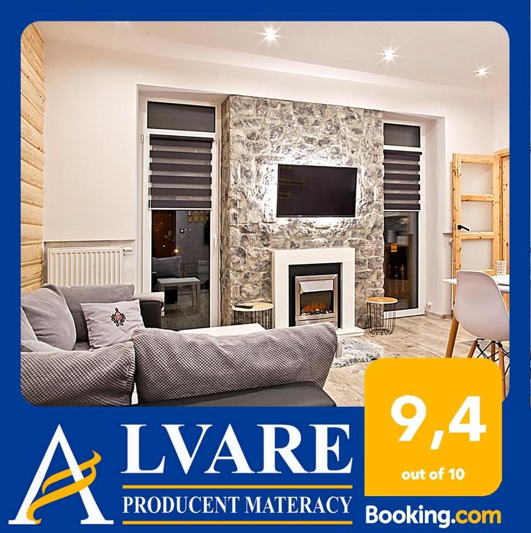 Televízia a/alebo spoločenská miestnosť v ubytovaní ALVARE Apartament - Krynica Zdrój noclegi