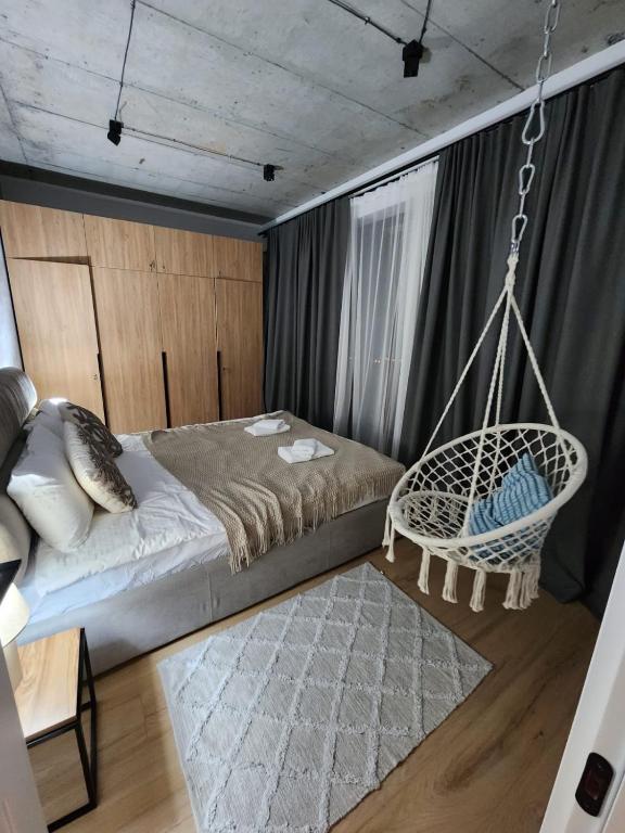 Postel nebo postele na pokoji v ubytování New Gudauri Apartments in Twins