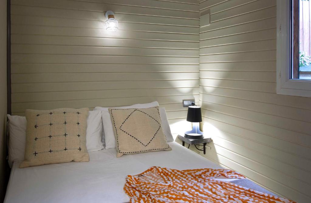 Postel nebo postele na pokoji v ubytování Camping Caledonia