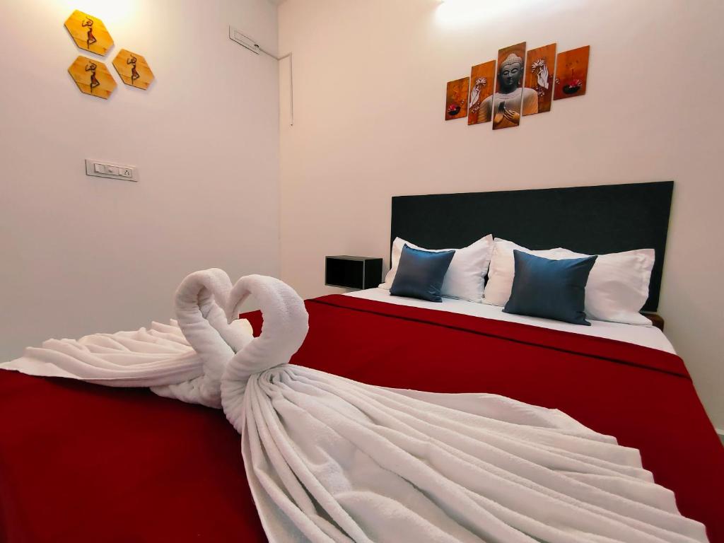Postel nebo postele na pokoji v ubytování De Lumaa seaside elite