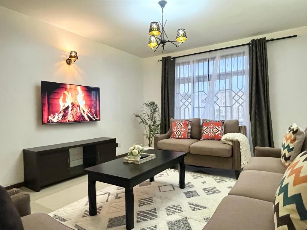 Posezení v ubytování Milimani Suites With Pool, GYM, Secure Parking