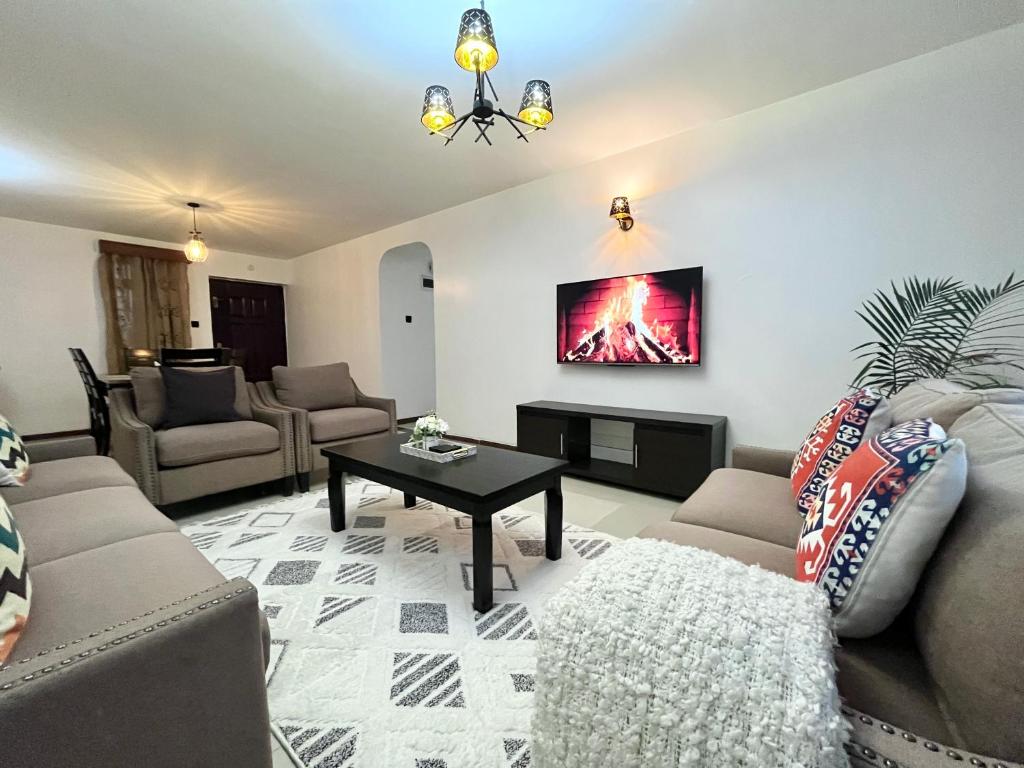 Posezení v ubytování Milimani Suites With Pool, GYM, Secure Parking