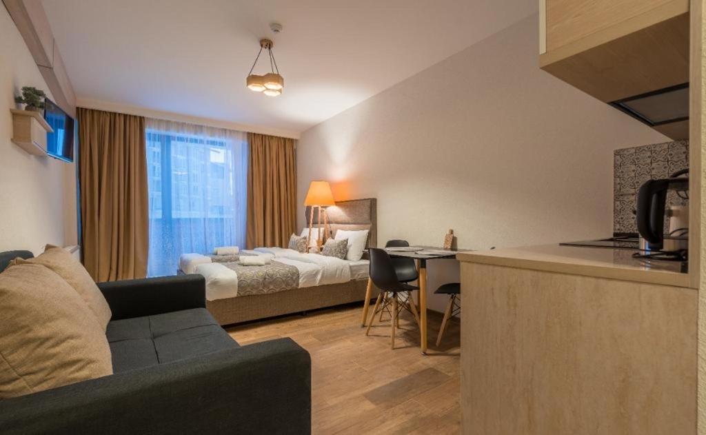 Postel nebo postele na pokoji v ubytování New Gudauri Apartments in Twins