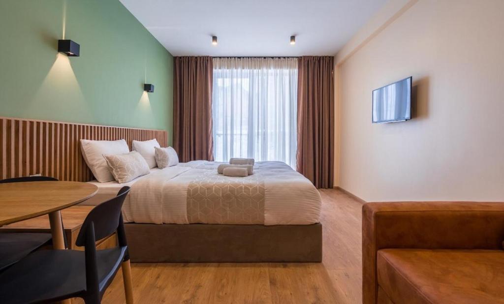 Postel nebo postele na pokoji v ubytování New Gudauri Apartments in Twins