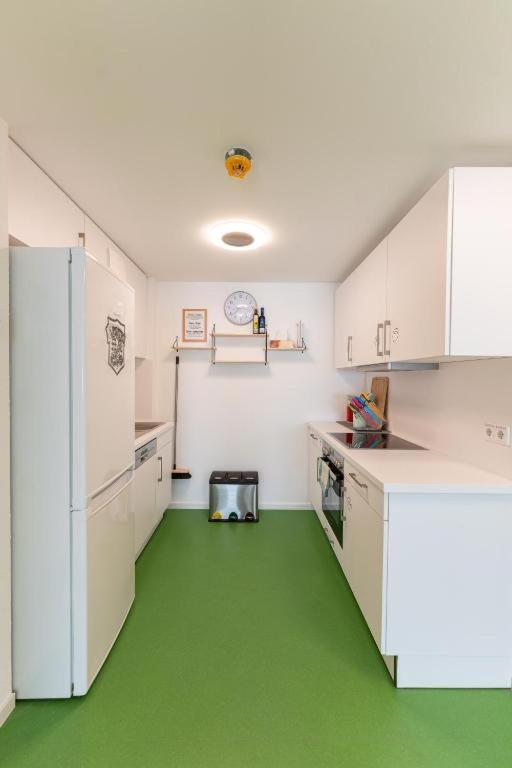 Kuchyň nebo kuchyňský kout v ubytování Hostel Mannheim