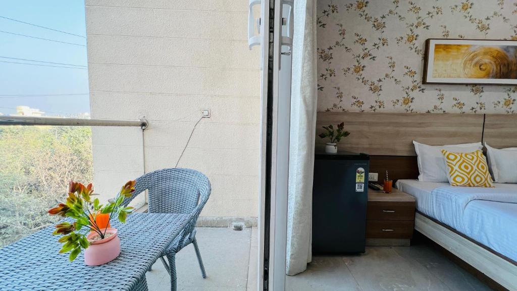 Postel nebo postele na pokoji v ubytování Olive Service Apartments - Medanta Medicity