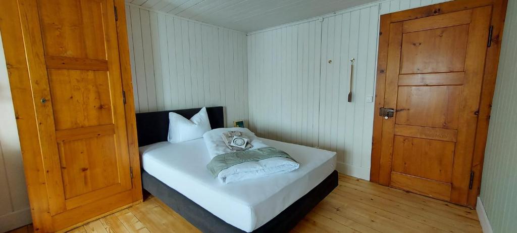 Postel nebo postele na pokoji v ubytování Refugio Heiligkreuz