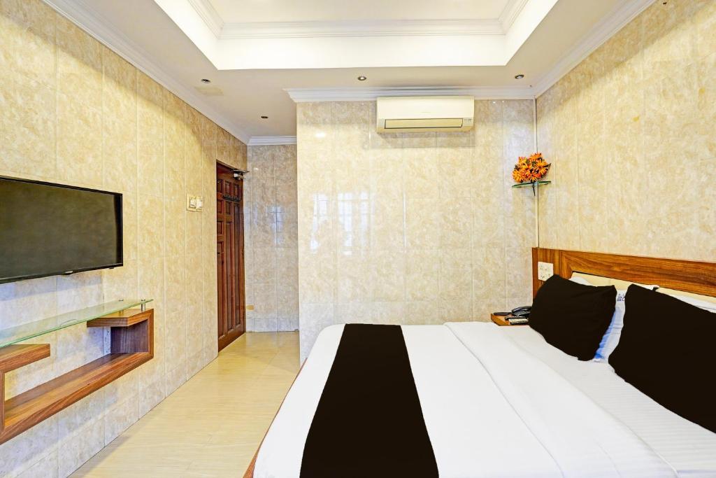 TV a/nebo společenská místnost v ubytování Super Hotel O Triplicane formerly Park Royal