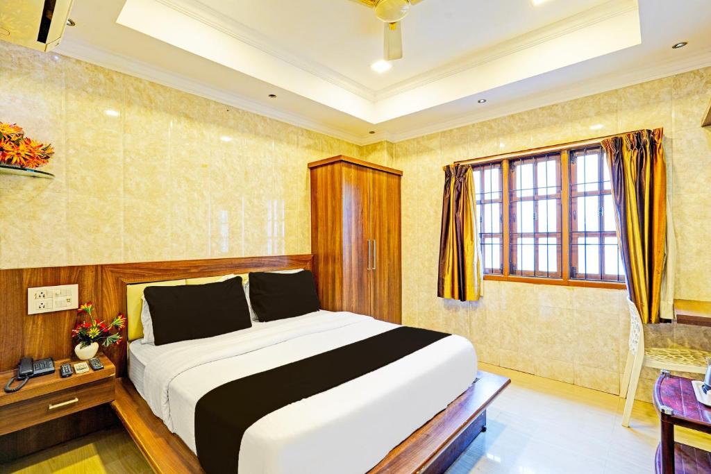 Postel nebo postele na pokoji v ubytování Super Hotel O Triplicane formerly Park Royal