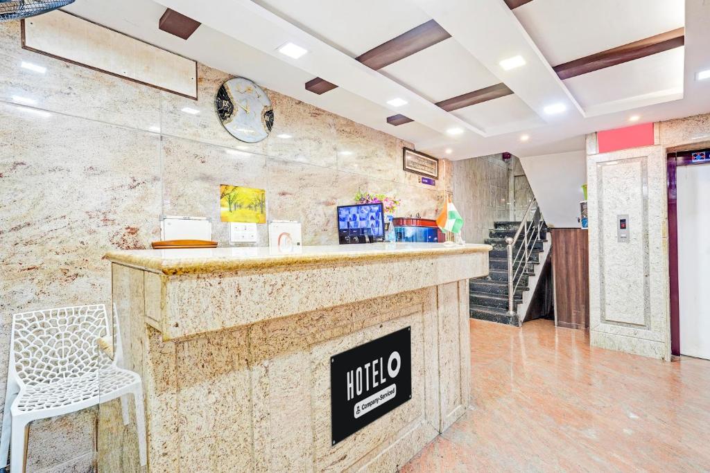 Kuchyň nebo kuchyňský kout v ubytování Super Hotel O Triplicane formerly Park Royal