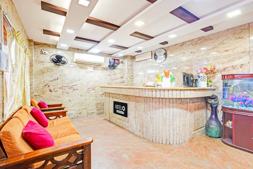 TV a/nebo společenská místnost v ubytování Super Hotel O Triplicane formerly Park Royal